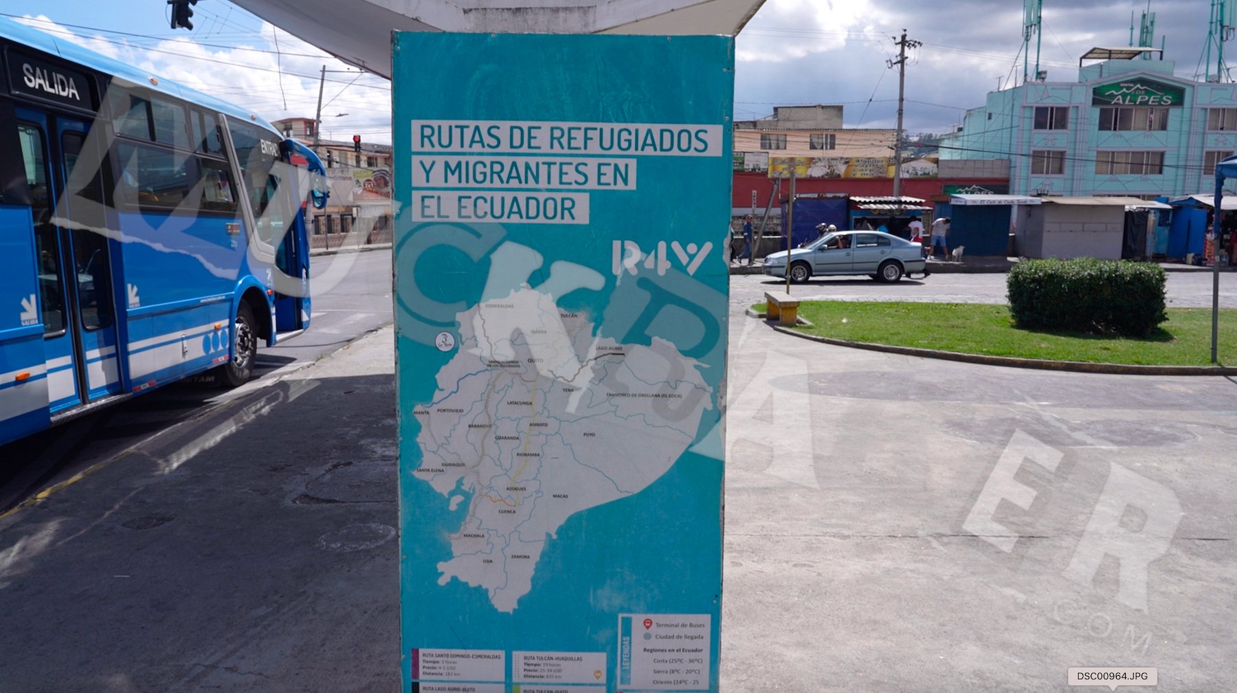 A photo of a migration routes map of Ecuador at a bus stop in Tulcan