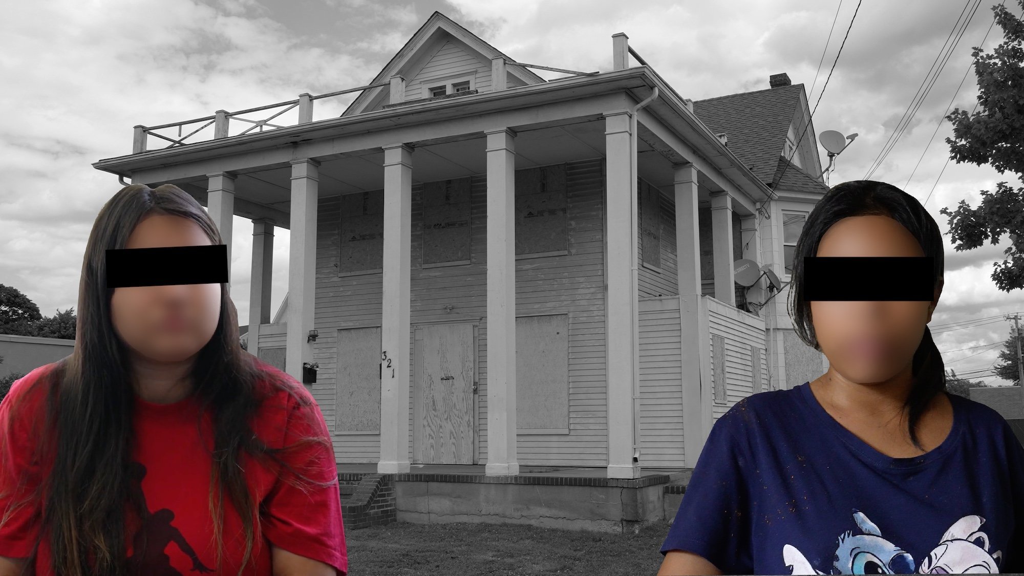 Two young girls with blurred out faces in front of an abandoned house