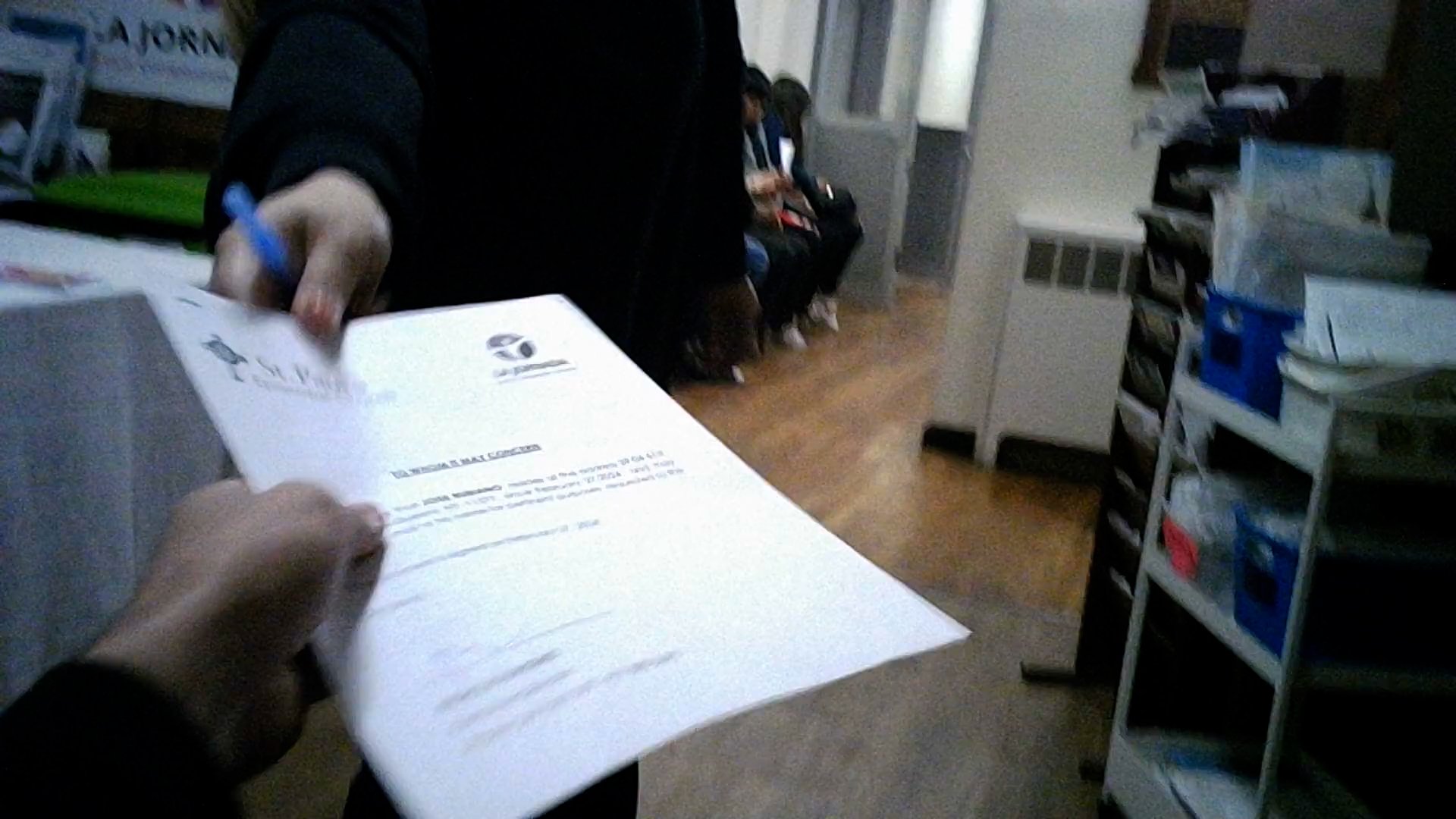 Woman hands over fraudulent papers at La Jornada