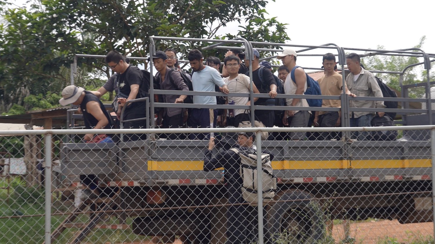 A truckload full of men who just crossed the Darién Gap in Panama